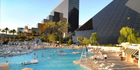 What is the reasoning for nearly all Vegas hotels to close their pools at 5 or 6 p.m.?