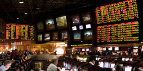 Do casino sports books lay off bets to balance their action?