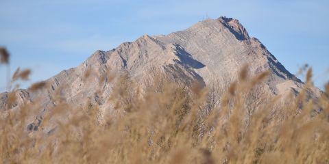 Is the official name Sunrise Mountain? And are the dry lake beds south of Las Vegas ever wet? 