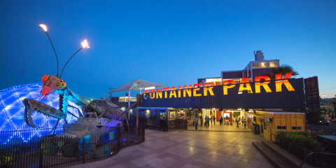 What's the story behind the big praying mantis sculpture in front of the Container Park downtown?