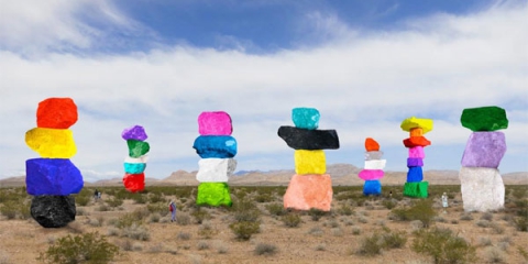 From I-15 around Jean, you can see what looks like a sculpture of colored rocks piled up on each other. What is it?