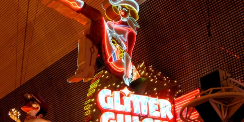 Is the Neon Cowgirl's name Sassy Sally or Vegas Vickie?